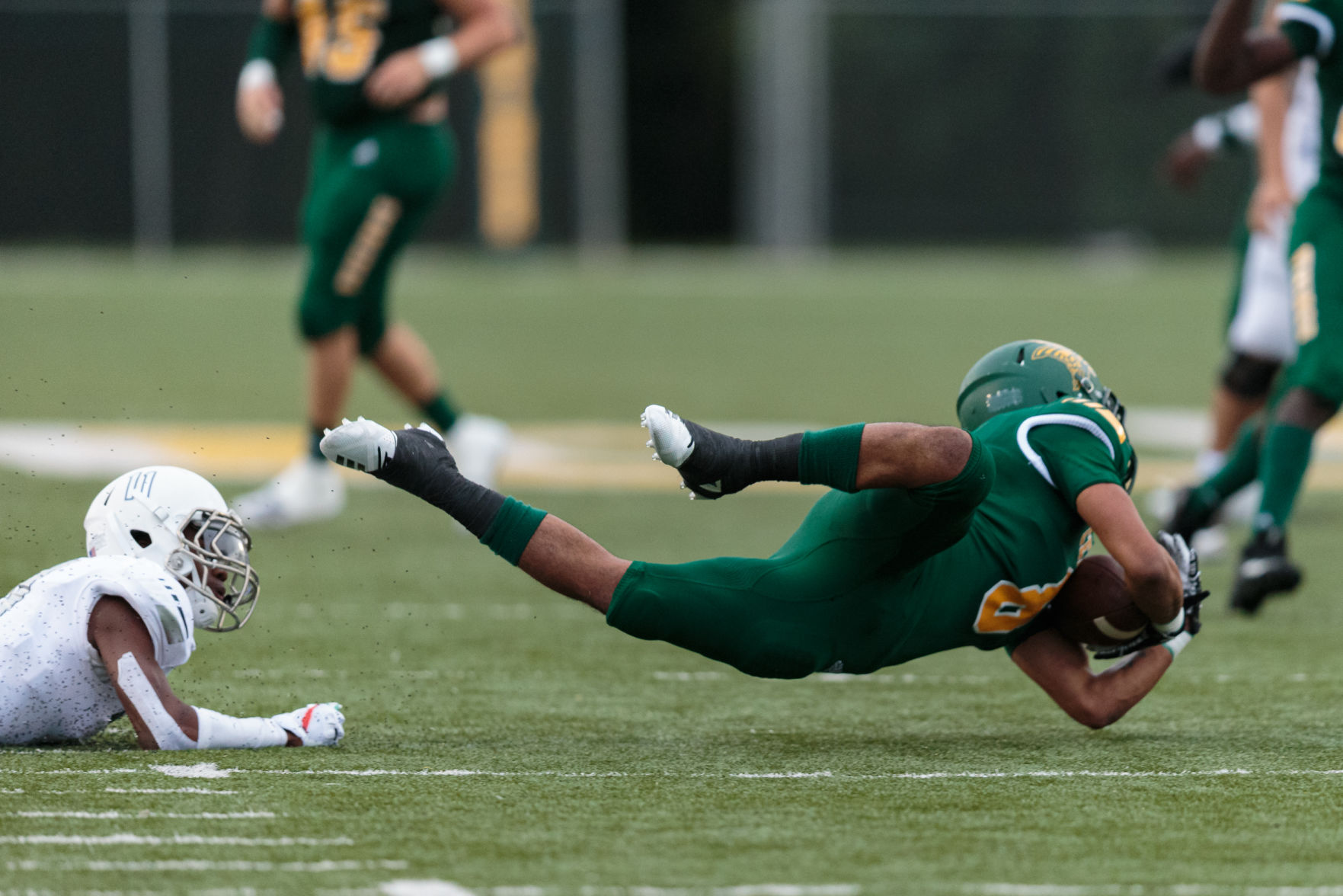The Ragin' Bulls come from behind in the Battle of the Horns to defeat the Vikings 27-20.